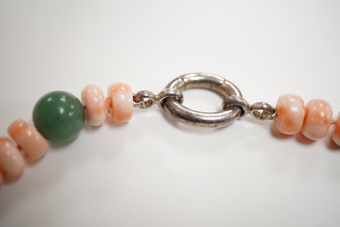 A 20th century adventurine quartz and coral bead set necklace, with a 925 clasp, 80cm, together with a similar carved coral line drop pendant, with a 750 white metal clasp.